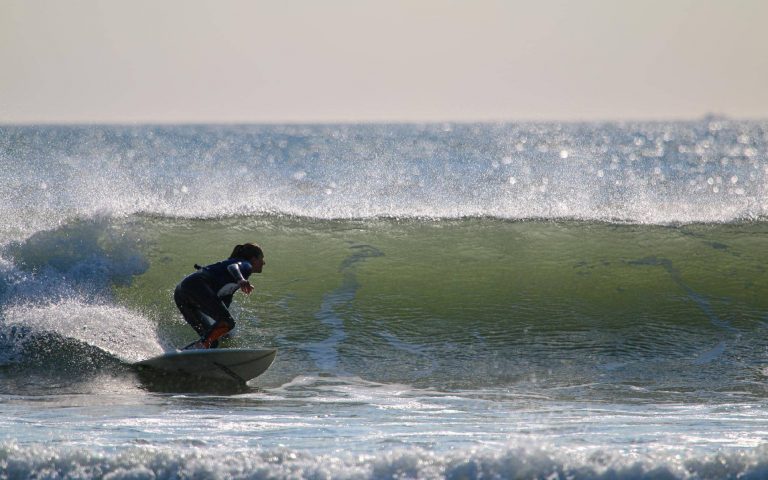 woman-surfing-in-devon-croyde
